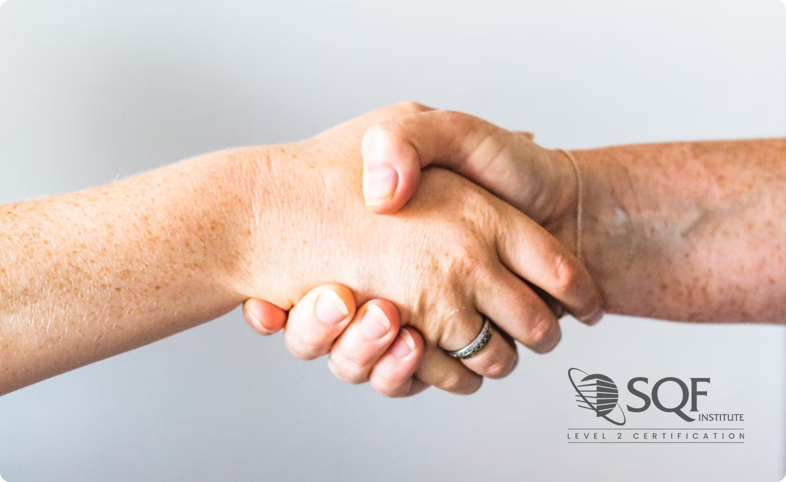handshake with sqf certified logo