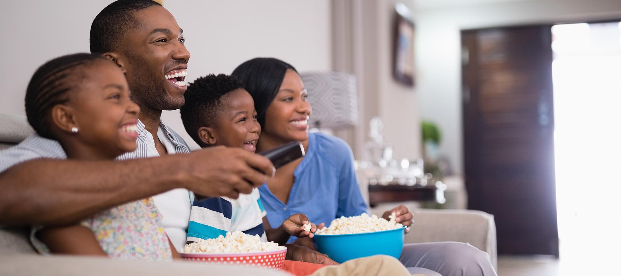 Family eating popcorn